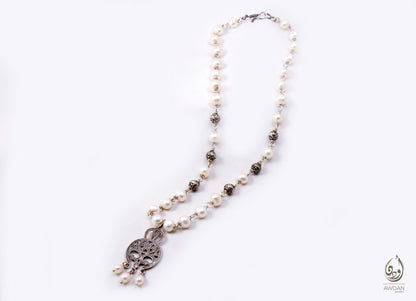 Tribal Pendant On Wired Pearls Necklace