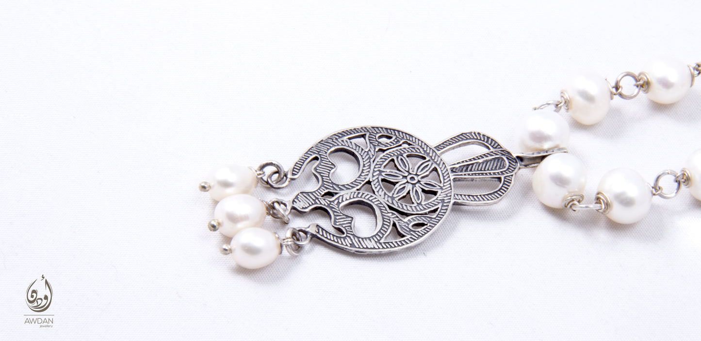 Tribal Pendant On Wired Pearls Necklace