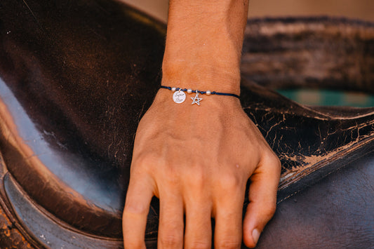 Double Charm on Knotted Thread Bracelet